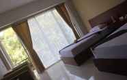 Bedroom 6 Ubud Hotel and Villas Malang