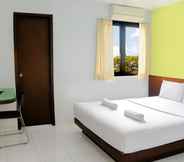 ห้องนอน 5 LeGreen Suite Ratulangi