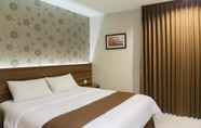 Bedroom 6 Hotel New Coklat