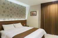 Bedroom Hotel New Coklat