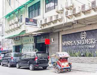 Bên ngoài 2 Wisma Sederhana Mitra RedDoorz