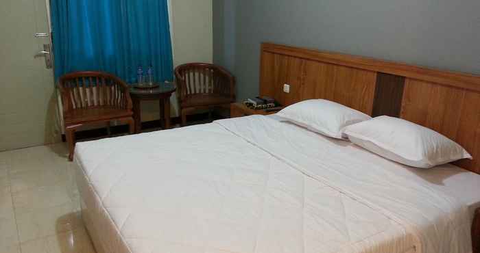 ห้องนอน Grand Amanda Guest House Syariah