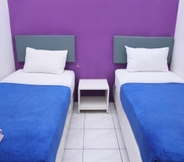 Kamar Tidur 4 Griya Surya Solo Guesthouse