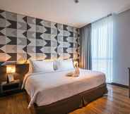 Bedroom 6 Luminor Hotel Jemursari By WH
