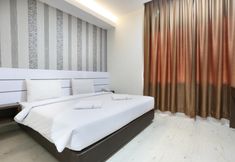 Bedroom 5 Redlink Hotel Batam