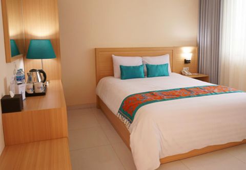 Bedroom Hotel Dermaga Keluarga Sonosewu