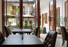 レストラン 6 Meliala Inn