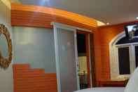 ห้องนอน Javaretro Suite Pasteur Bandung