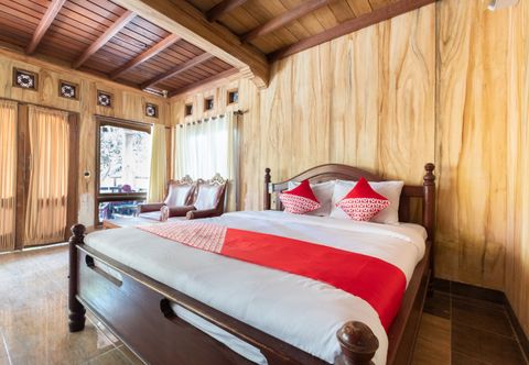 Bedroom OYO 1425 Beach Wind Bungalows