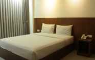 Kamar Tidur 2 Lotus Art & Garden Hotel