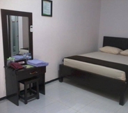 Bedroom 6 Alliya Hotel (Syariah)