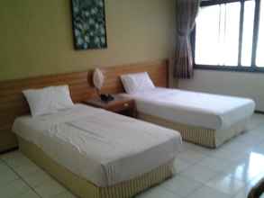 Kamar Tidur 4 Abadi Asri Hotel 