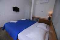 Kamar Tidur Pawon Cokelat Guesthouse