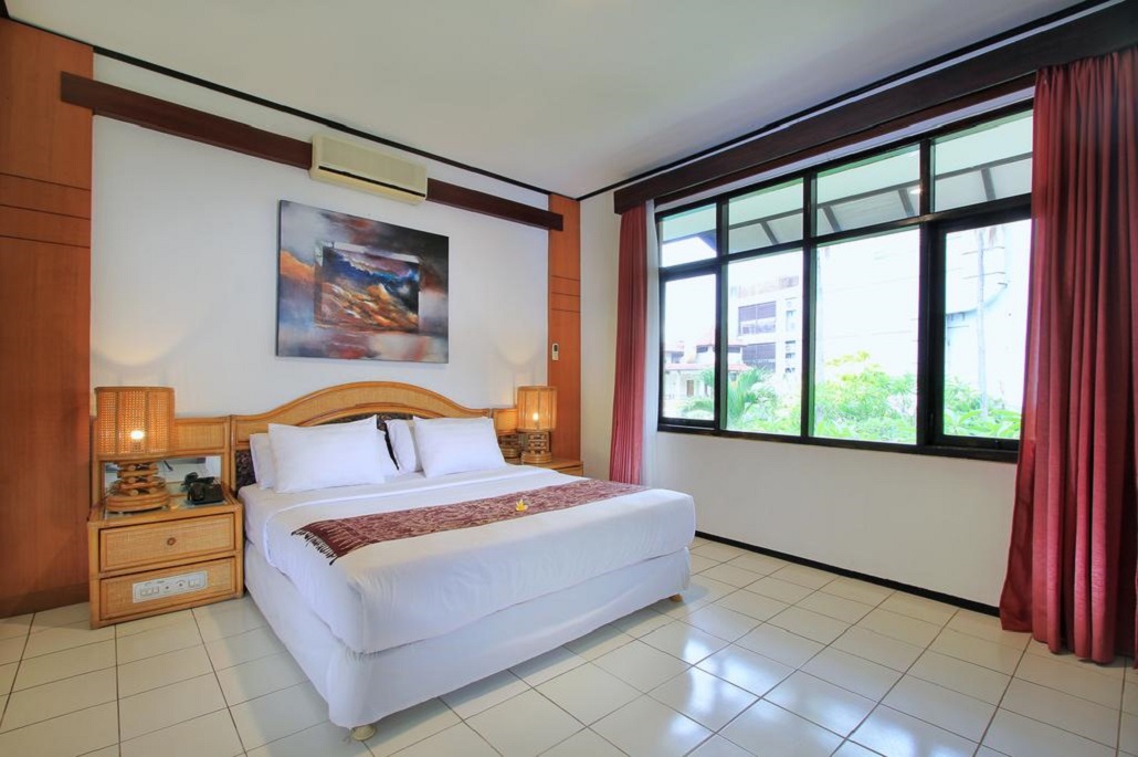 Bedroom Puri Naga Beachfront Cottages