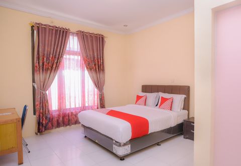 臥室 OYO 884 Rumoh PMI Hotel