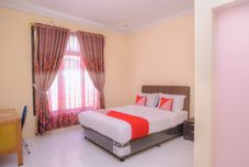 臥室 OYO 884 Rumoh PMI Hotel