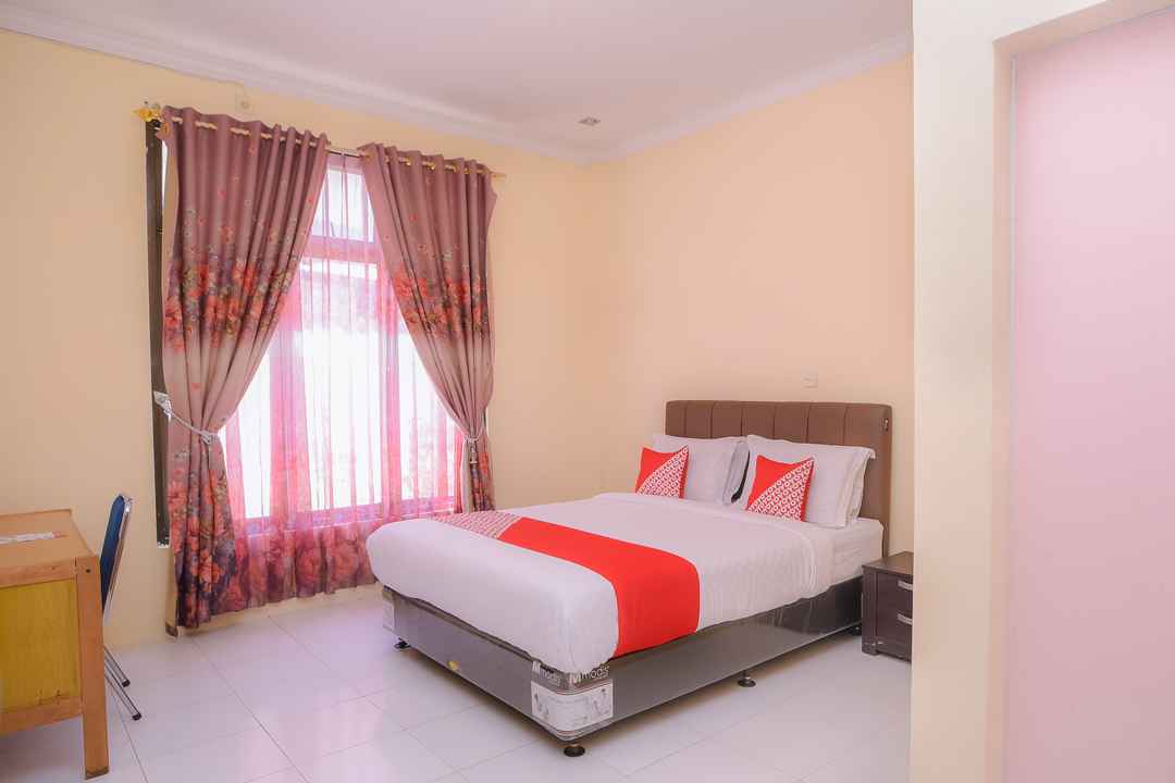 Harga kamar OYO 884 Rumoh PMI Hotel, Baiturrahman untuk tanggal 0404