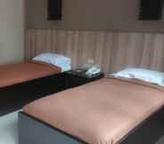 Kamar Tidur 4 Puri 56 Hotel & Resto