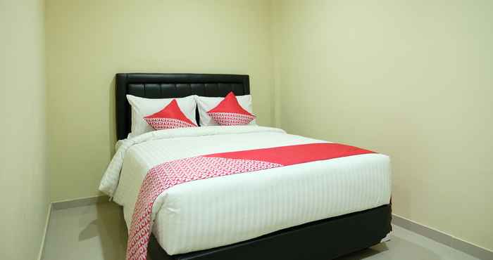 Kamar Tidur OYO 1149 Hotel Mustika