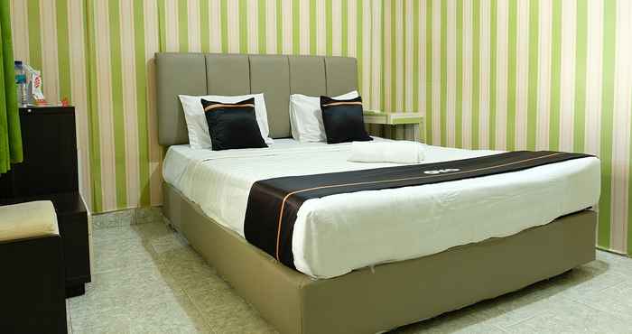 ห้องนอน OYO 2186 Esbe Hotel Syariah