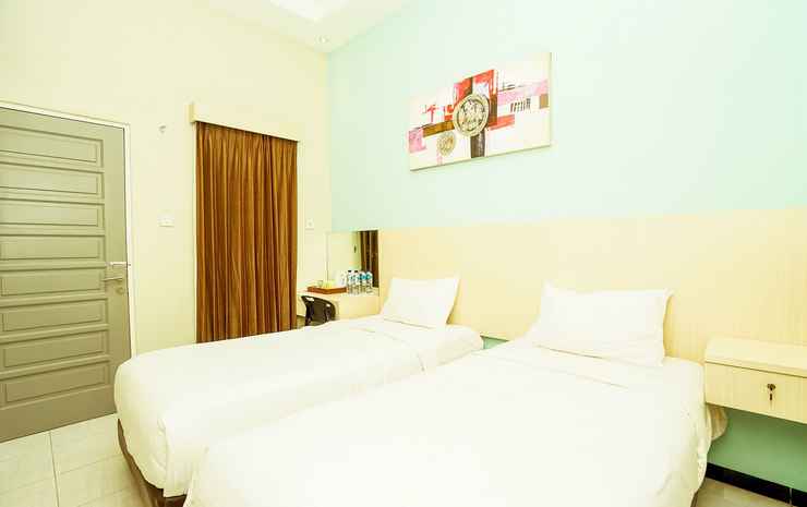 Ardhya Guest House Syariah by eCommerceLoka Surabaya - Deluxe Twin Room