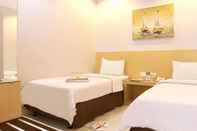 Bedroom Grande Hotel Lampung Powered by Archipelago