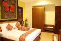 Kamar Tidur The Luxio Hotel & Resort