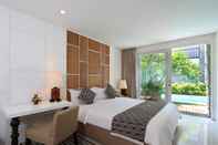 ห้องนอน The Kanjeng Suites Seminyak