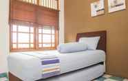 Kamar Tidur 5 Junjunan Dalam Sharia Guesthouse