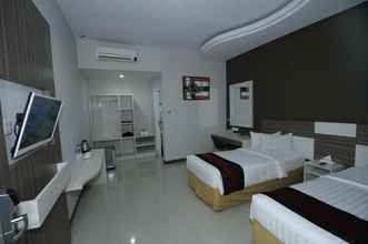 Kamar Tidur 4 The Madeline Hotel