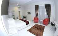 Kamar Tidur 6 The Madeline Hotel