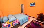 Kamar Tidur 2 Comfort Room at Midi Homestay