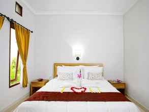 Kamar Tidur 4 Tanjung Sari Inn 