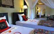 Kamar Tidur 4 Taruna Boutique Homestay & Spa