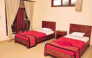 Kamar Tidur 4 Nick's Homestay