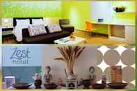 ห้องนอน Zest Jemursari by Swiss-Belhotel International