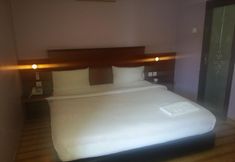 Bedroom 7 RedDoorz Plus near DC Mall Batam