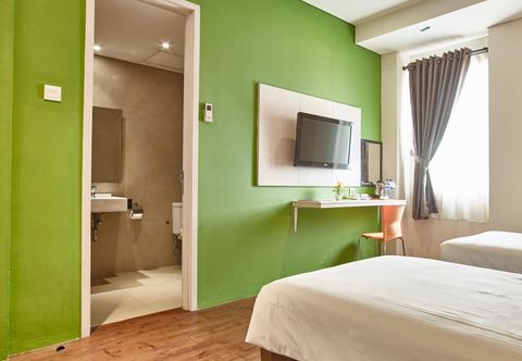 Kamar Tidur Dragon Inn Kemayoran
