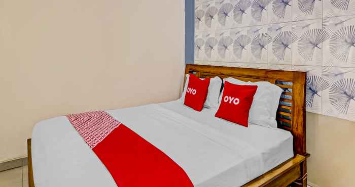 Kamar Tidur OYO 90681 Huiz De Rico Guesthouse Syariah