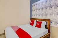 Kamar Tidur OYO 90681 Huiz De Rico Guesthouse Syariah