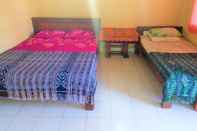 Bilik Tidur Arjuna Homestay Ubud