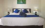 Kamar Tidur 4 Coconut Village Guest House