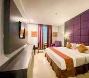 Bedroom 6 Grand Paragon Hotel 