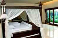 Kamar Tidur Griya Desa Hotel & Pool