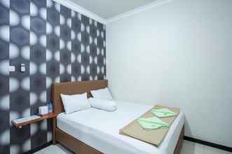 Bedroom 4 Palm Garden Guesthouse Samarinda