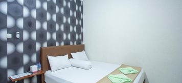 Bedroom 2 Palm Garden Guesthouse Samarinda