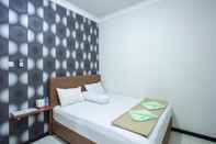 Phòng ngủ Palm Garden Guesthouse Samarinda