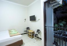 Bedroom 7 Palm Garden Guesthouse Samarinda