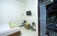 Kamar Tidur 7 Palm Garden Guesthouse Samarinda