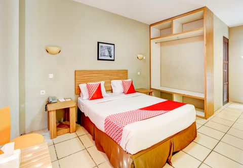 卧室 OYO 90027 Ulin Guesthouse